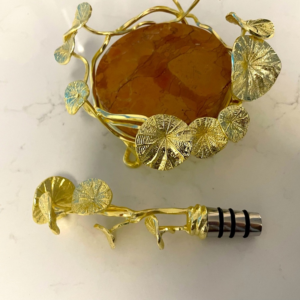 Michael Adam brand new gold leaf wine holder. No original box, great condition